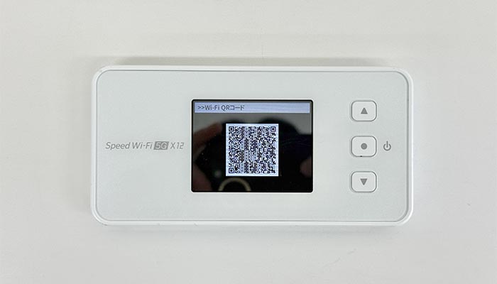 Speed Wi-Fi 5G X12でpovo2.0を利用する設定方法を解説している写真